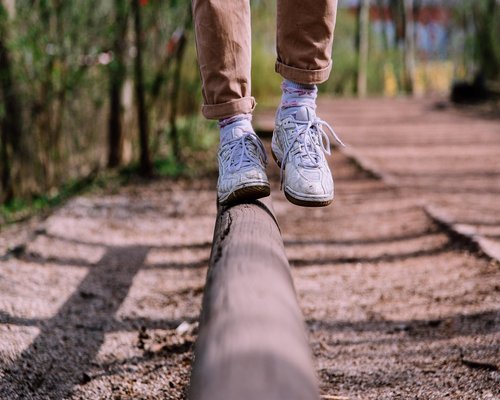 Close up view of person jogging in park