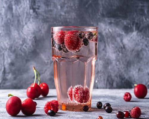 Fresh water glass and healthy fruits